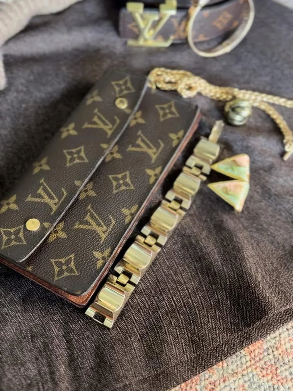 Louis Vuitton Monogram Canvas Accordion Clutch in Brown with Gold Accents